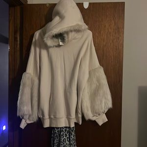 Soft and stylish, hooded sweatshirt. NWT. Never worn.